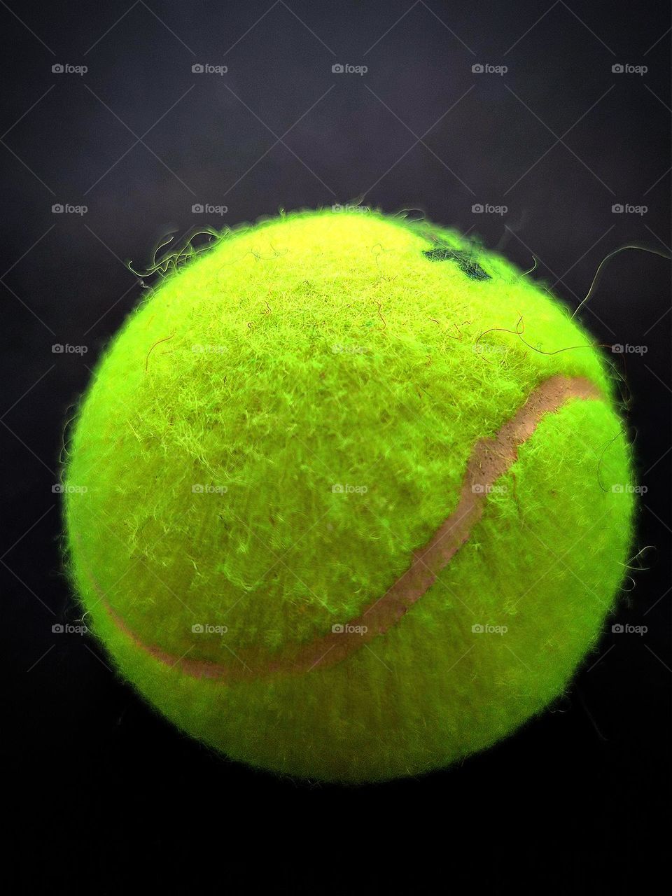 Tennis ball with a smile and an eye