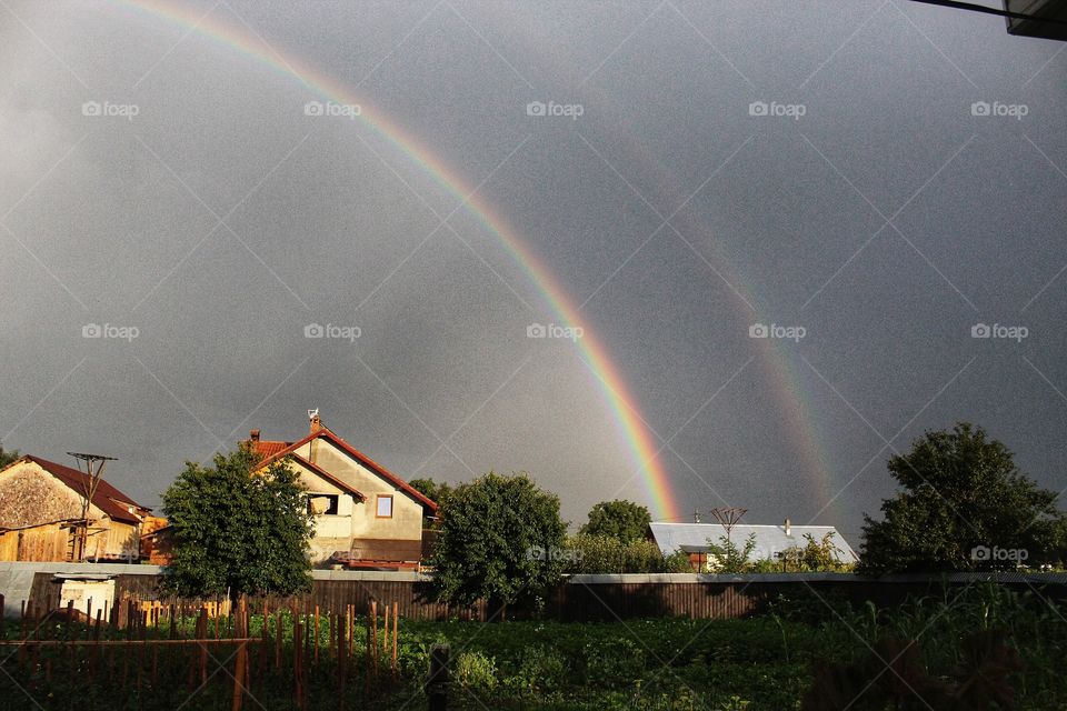 double rainbow in the Romania's sky afther rain.
