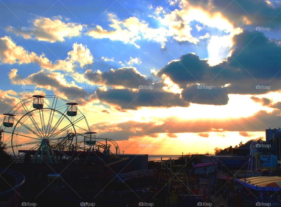 Sunset behind the silhouette of a funfair in Southend, Essex 