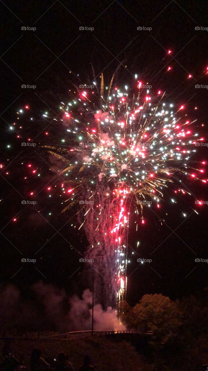A colorful fireworks display on a nice evening.