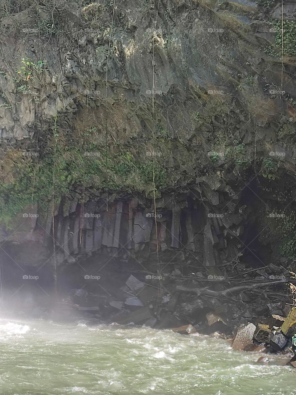 cliff by the waterfall