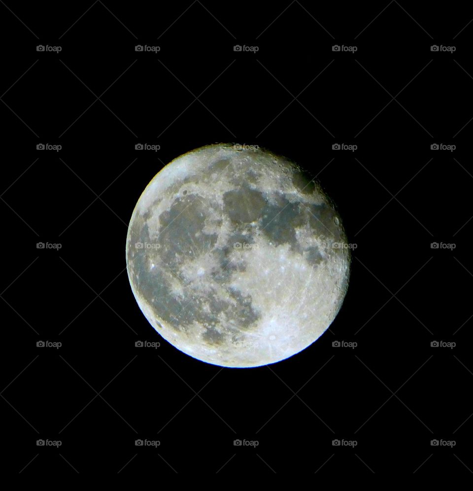 Close up of the full moon with striking detail of the craters