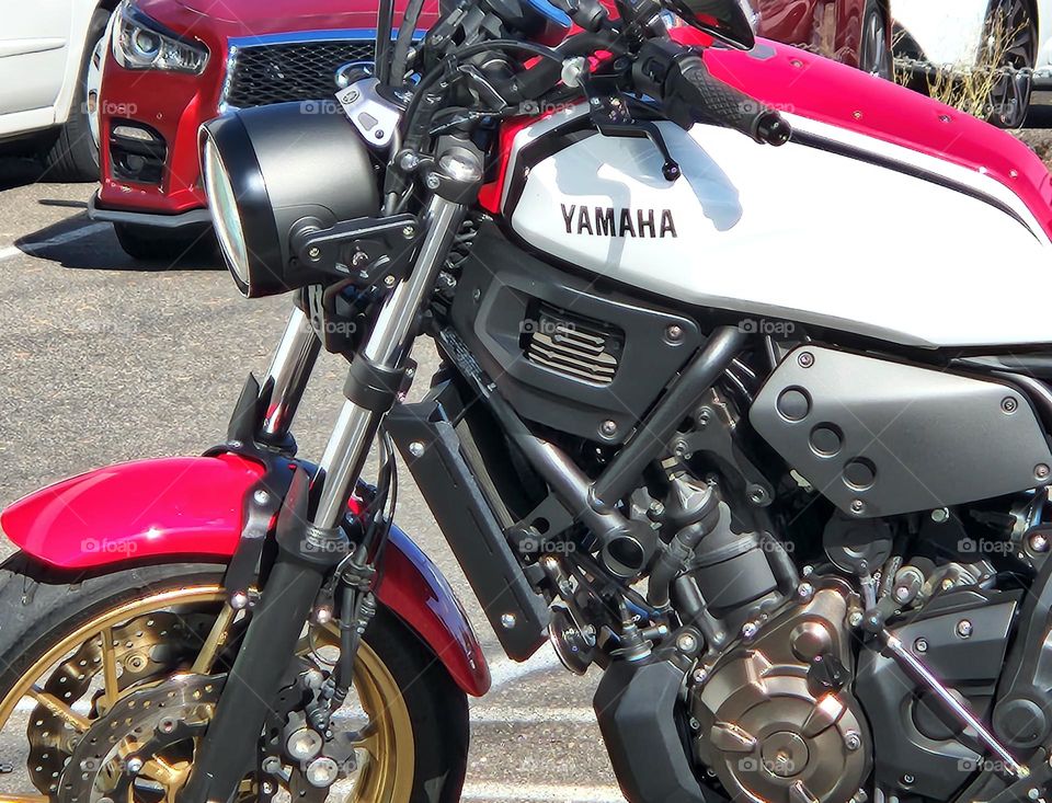 close up view of a red and white Yamaha motorcycle on a week day afternoon in Oregon