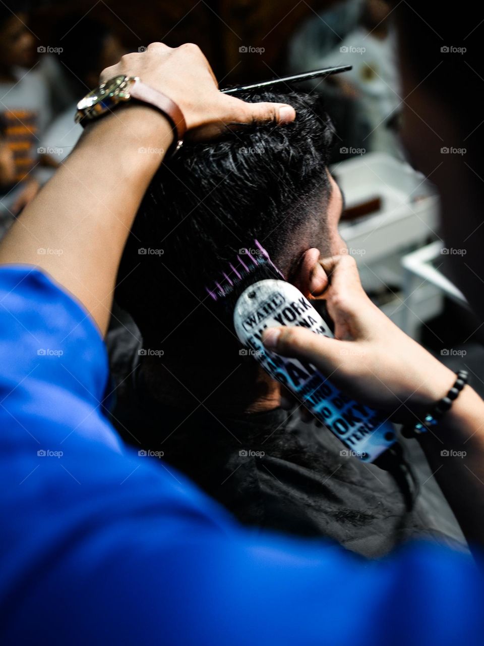 Having a haircut at a friends hair salon