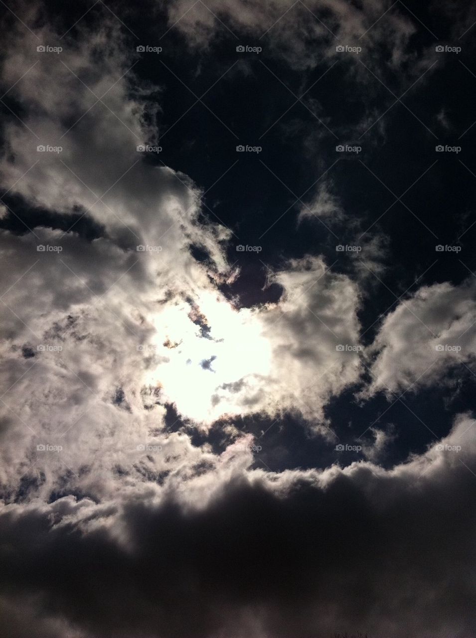 Sun rays through clouds 