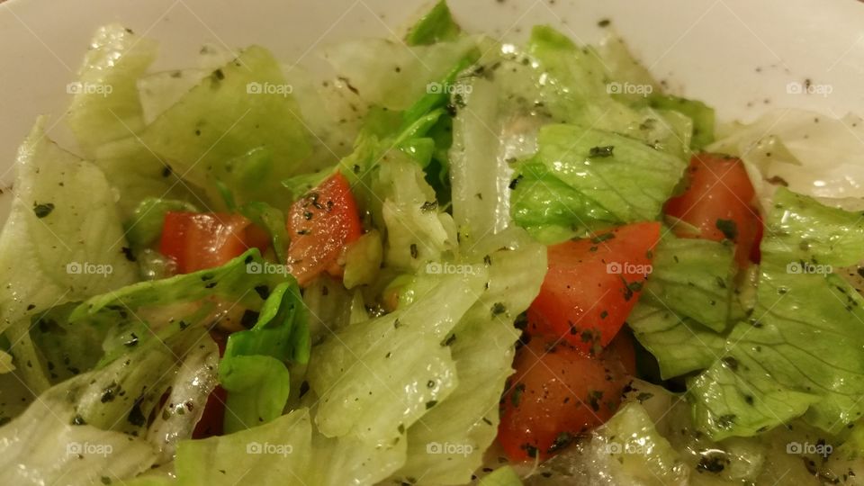 Healthy fresh Salad. low calorie green fresh salad with lettus, cucumber, tomato, vegetables for diet