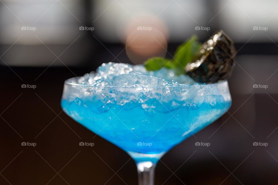 Macro shot of a cocktail in a glass