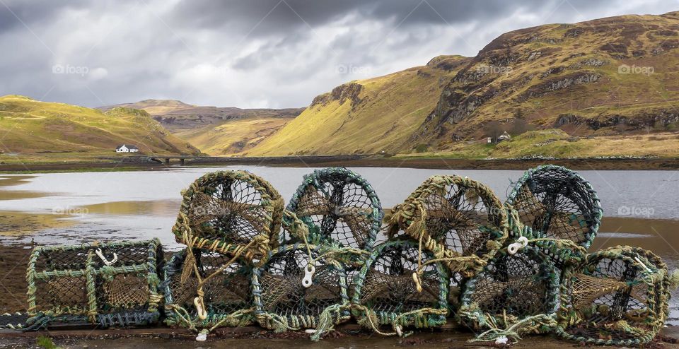 Lobster pots on the shore on the Isle of Skye, Scotland 