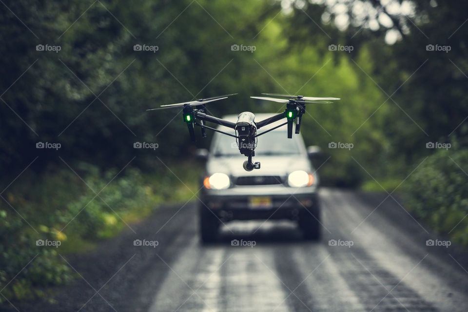 Drone flying over road