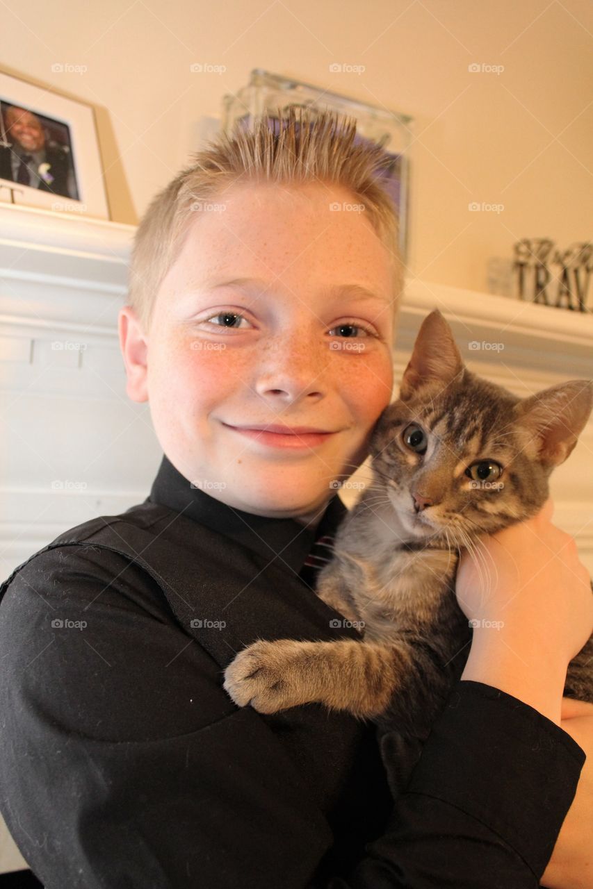 A boy and his kitten 