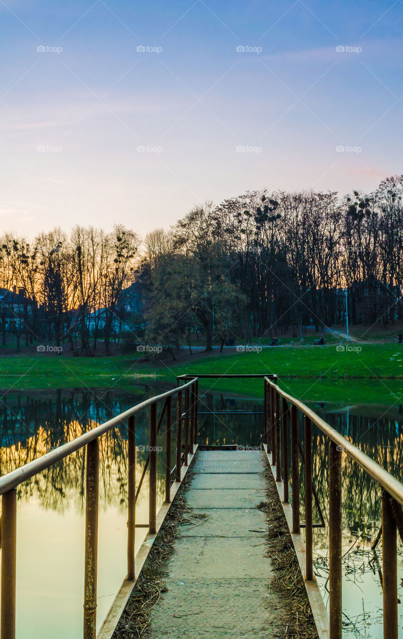 city park with lake in the spring season