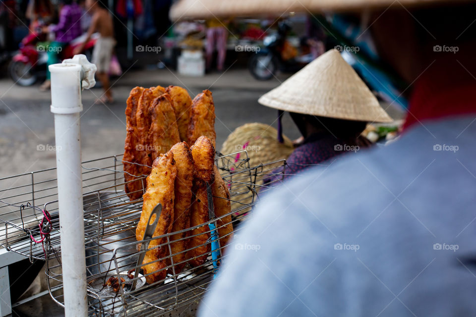 street food in vietnam.  non-hat salespeople