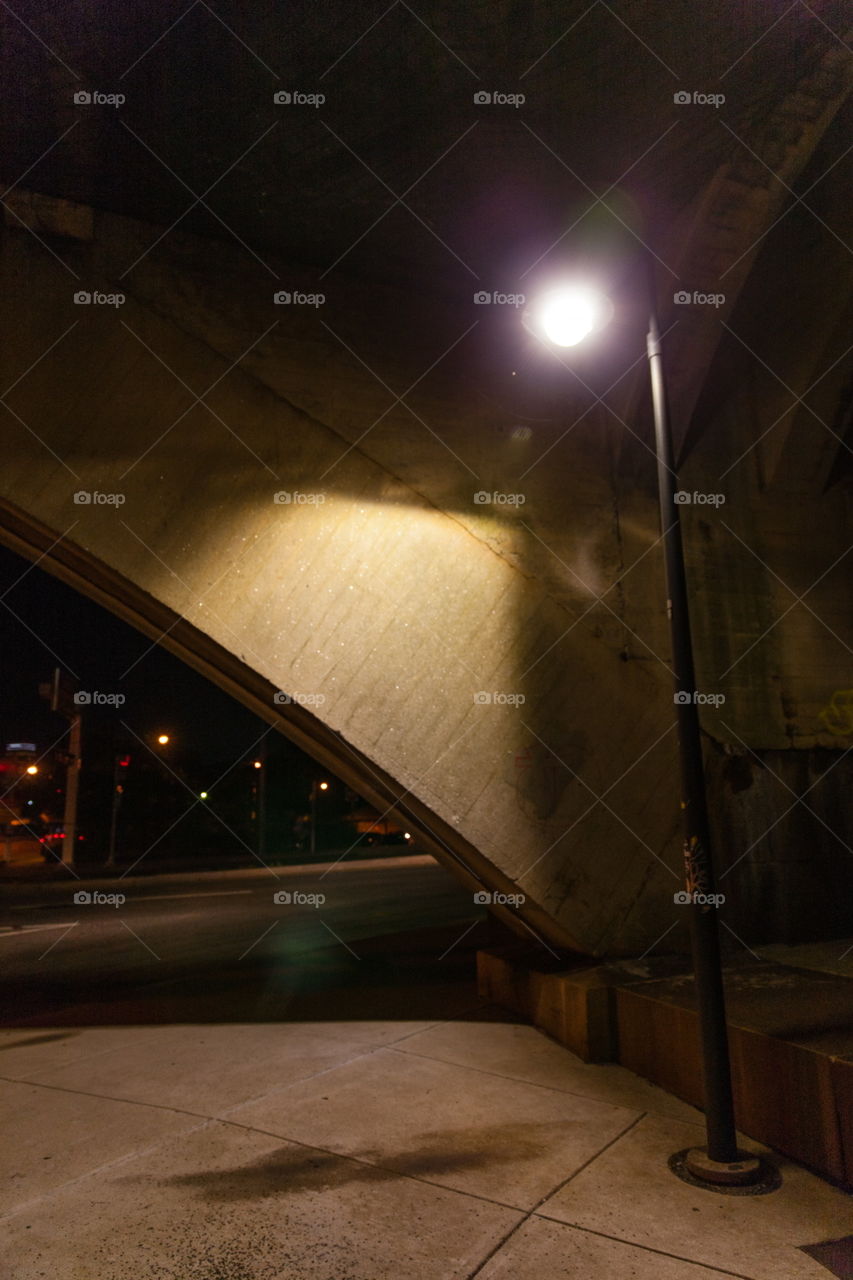 A light under a bridge in the city 