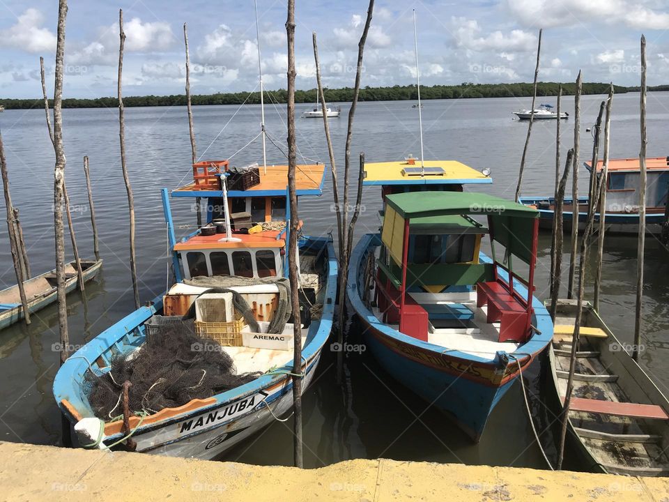 fishing boats moored at the port of Caravelas, Bahia, Brazil 