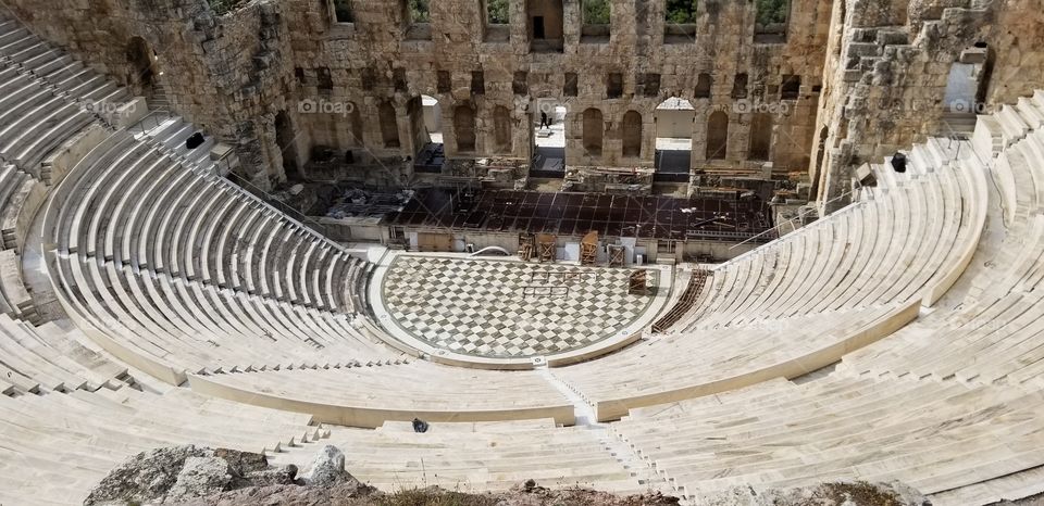View from above, looking down to the Odeon of Herodes Atticus theatre, famous ruins in Athens, Greece, Europe.