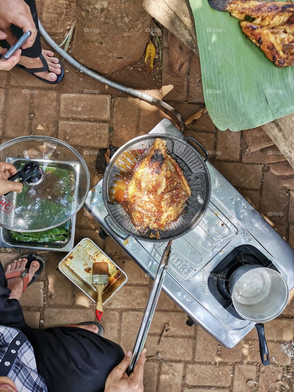 Frying fish in the park