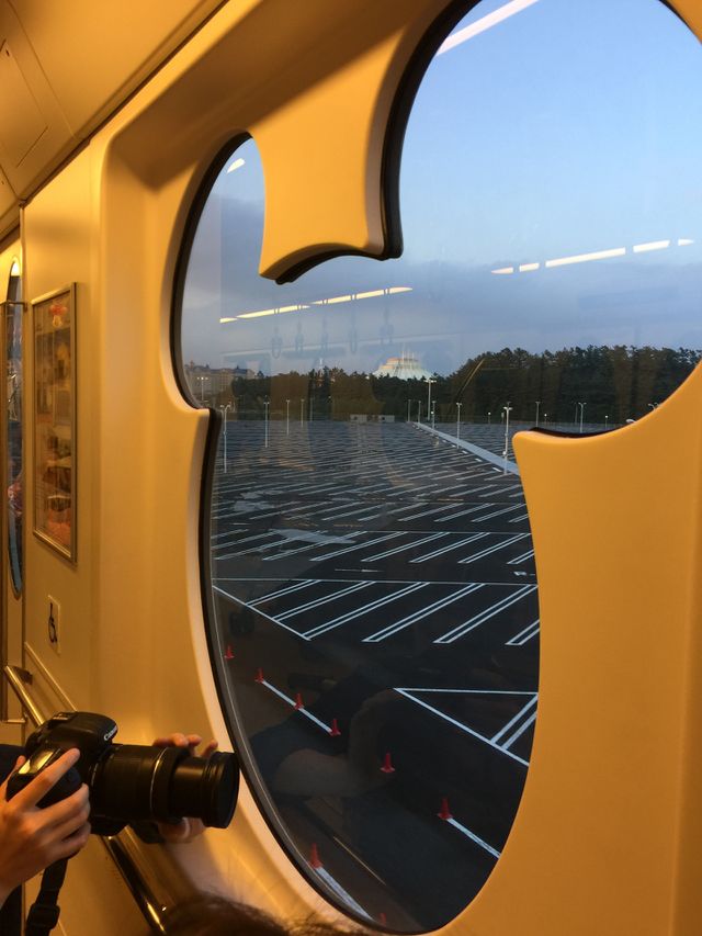 Mouse-shaped windows give visitors a view of Space Mountain at Tokyo Disneyland 