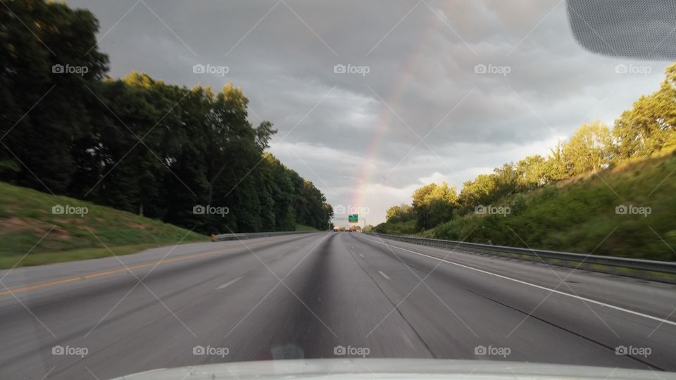 rainbow at the end of the road