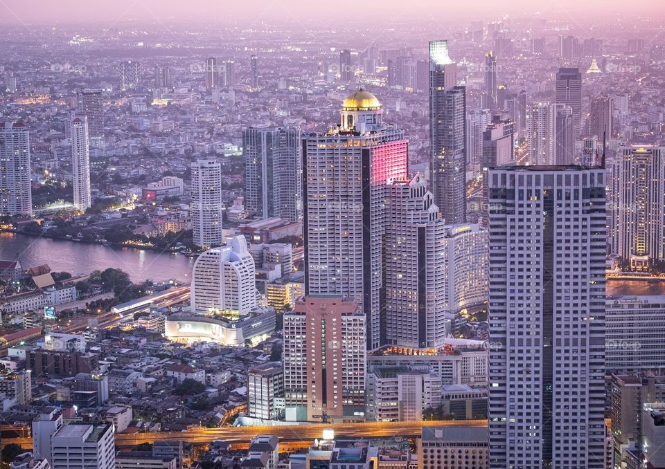 Twilight scene over skyscraper in Bangkok Thailand 