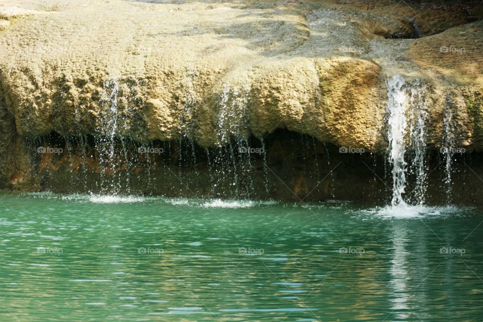 blue colour water of kedung biru, central java, indonesia