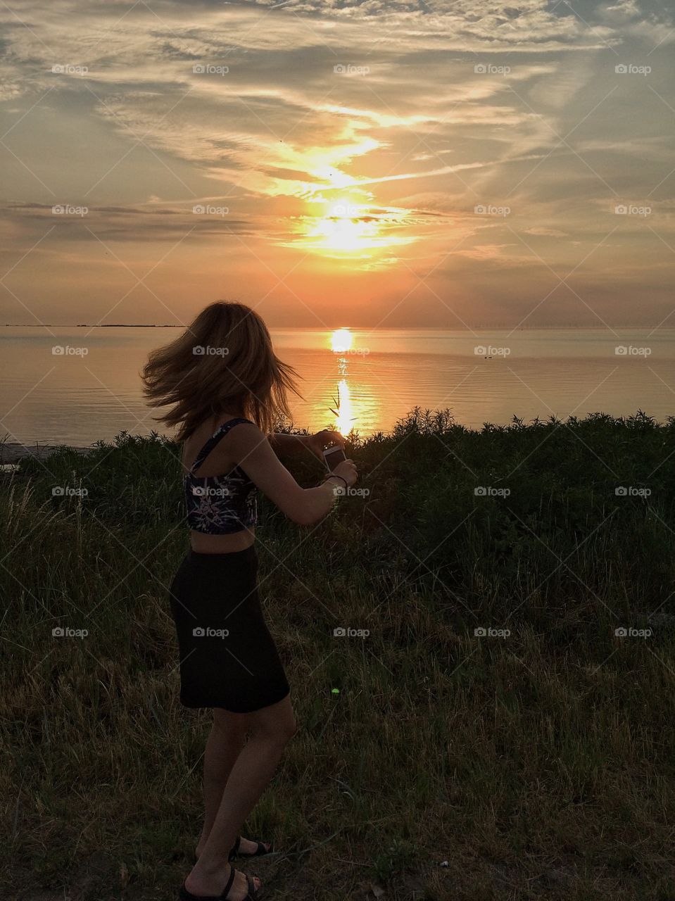 Girl in sunset