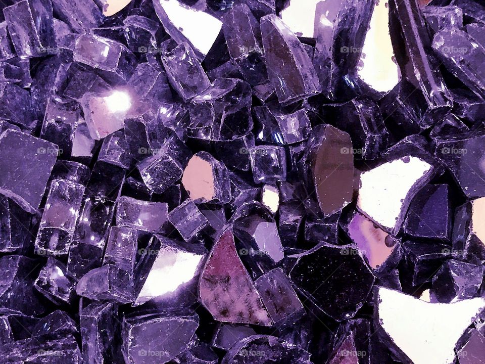 Sparkling purple glass shards.