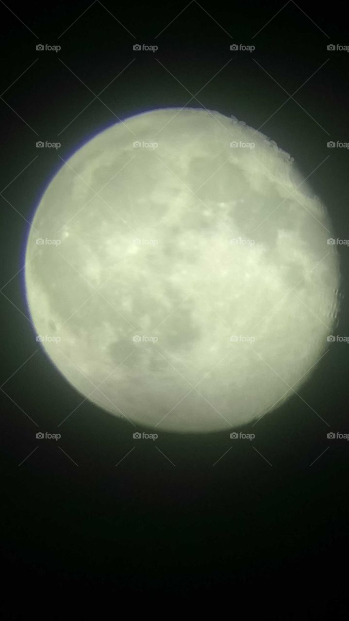 The moon seen with a 25X binoccular