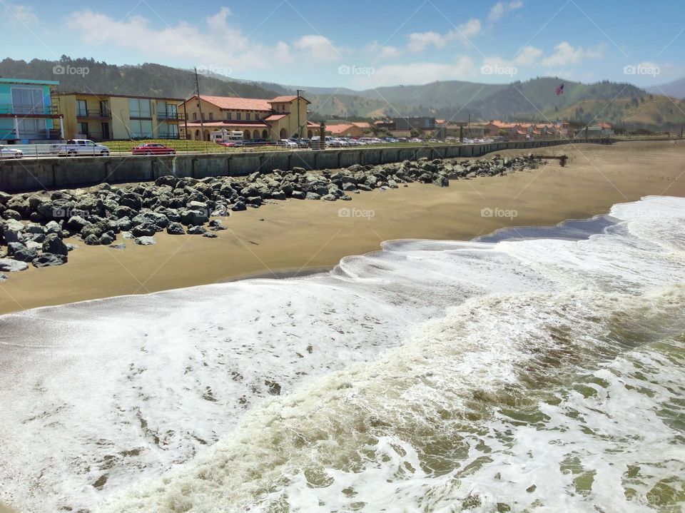 Sandy beach and rocky shore in California 