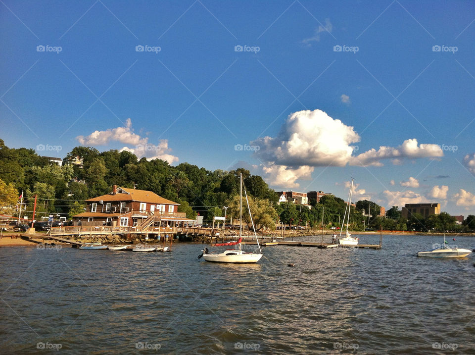 clouds house river sailboats by delvec