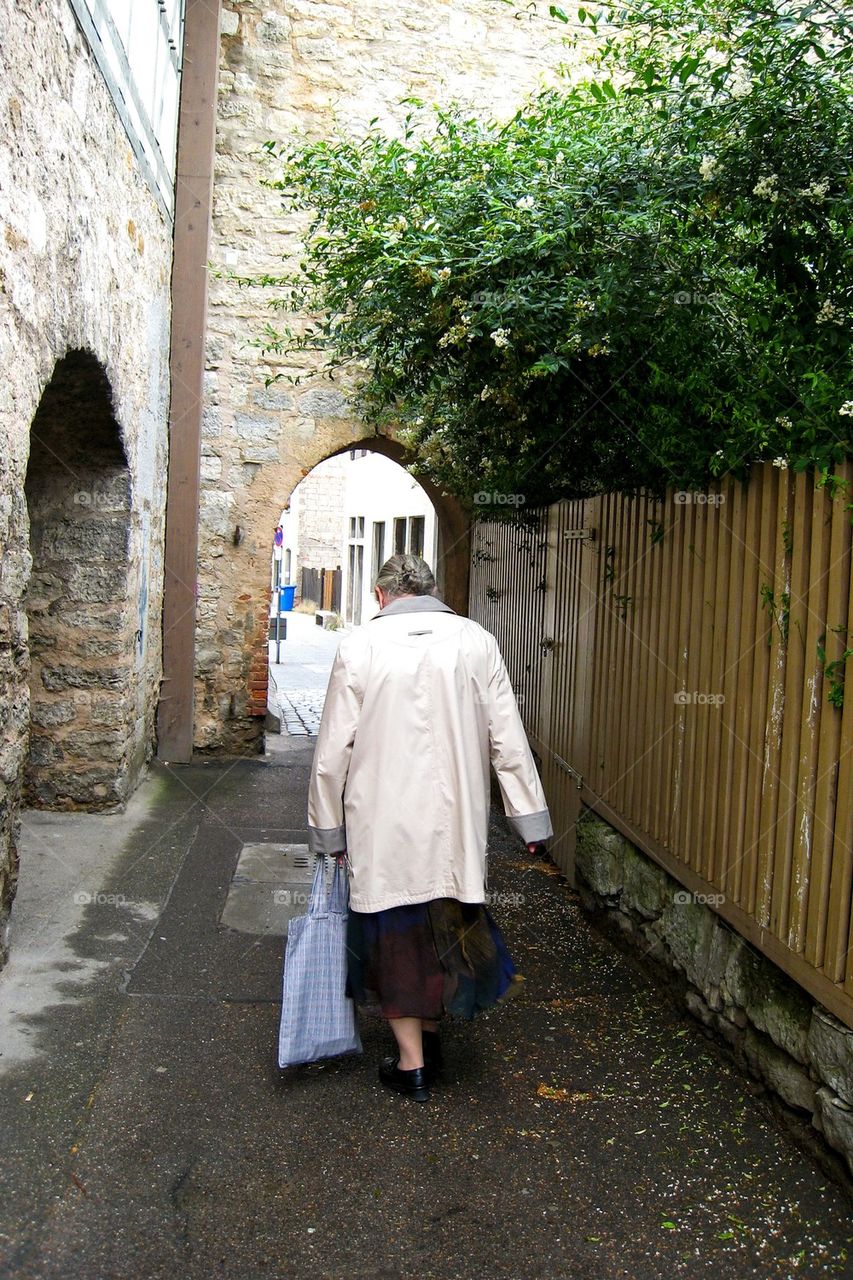 Elderly lady with groceries