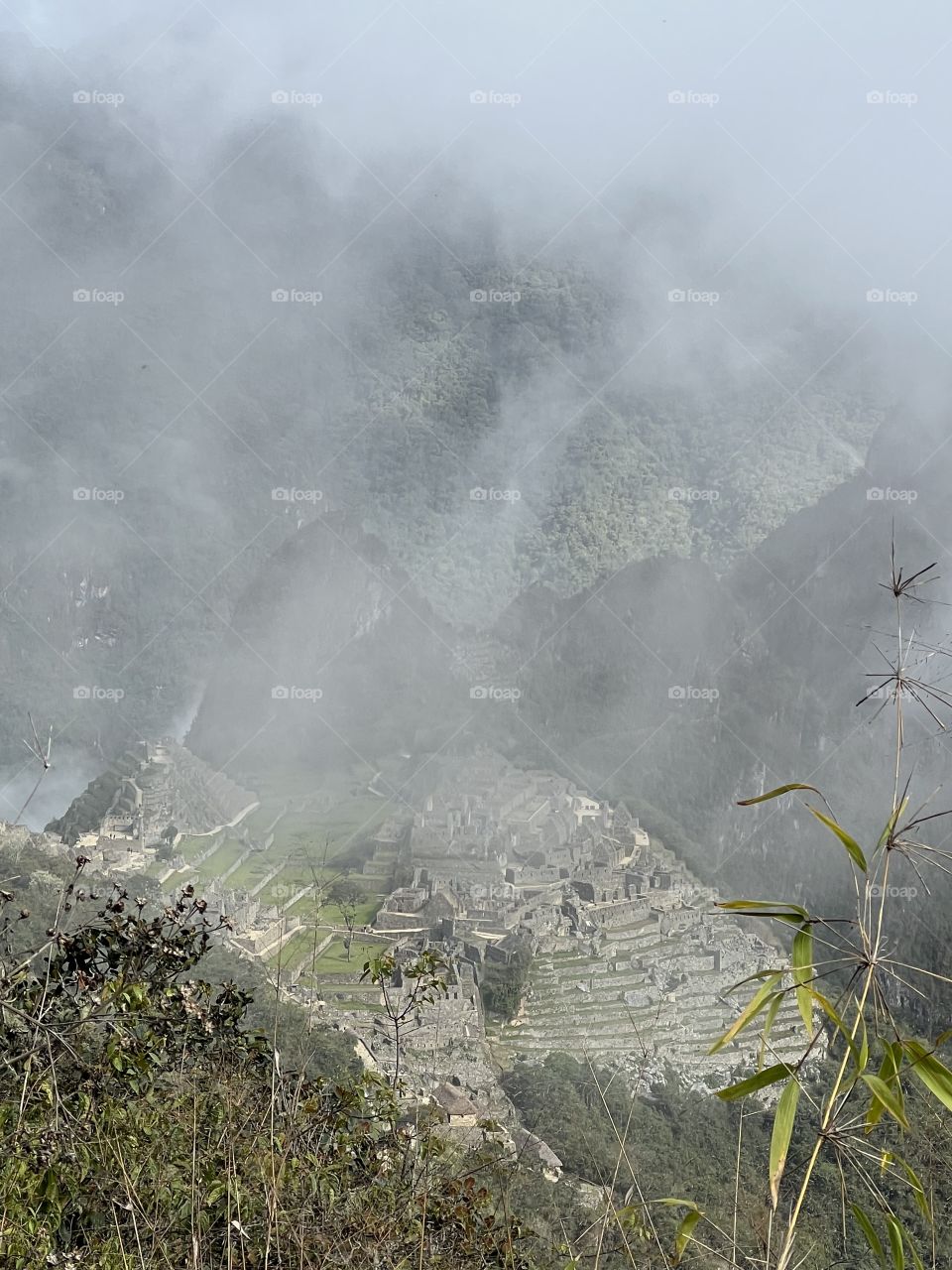 Glimpse of Machu Picchu in the fog