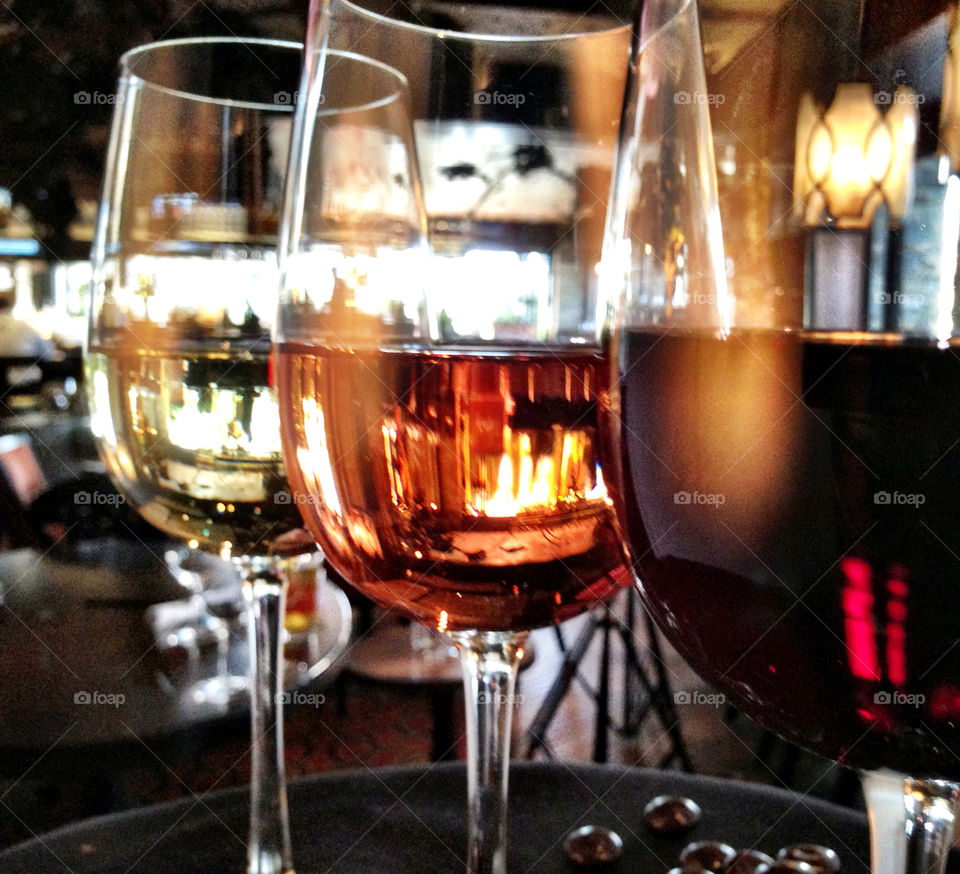 Red, rose and white wine on restaurant table