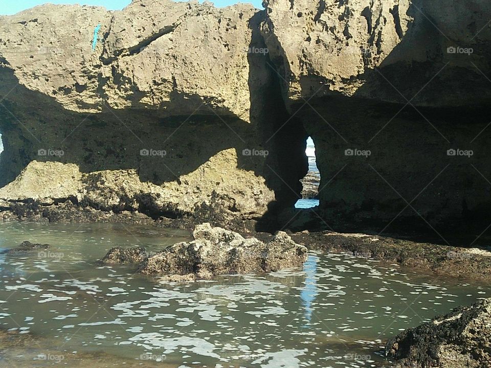 Beautiful cave at essaouira beach in Morocco