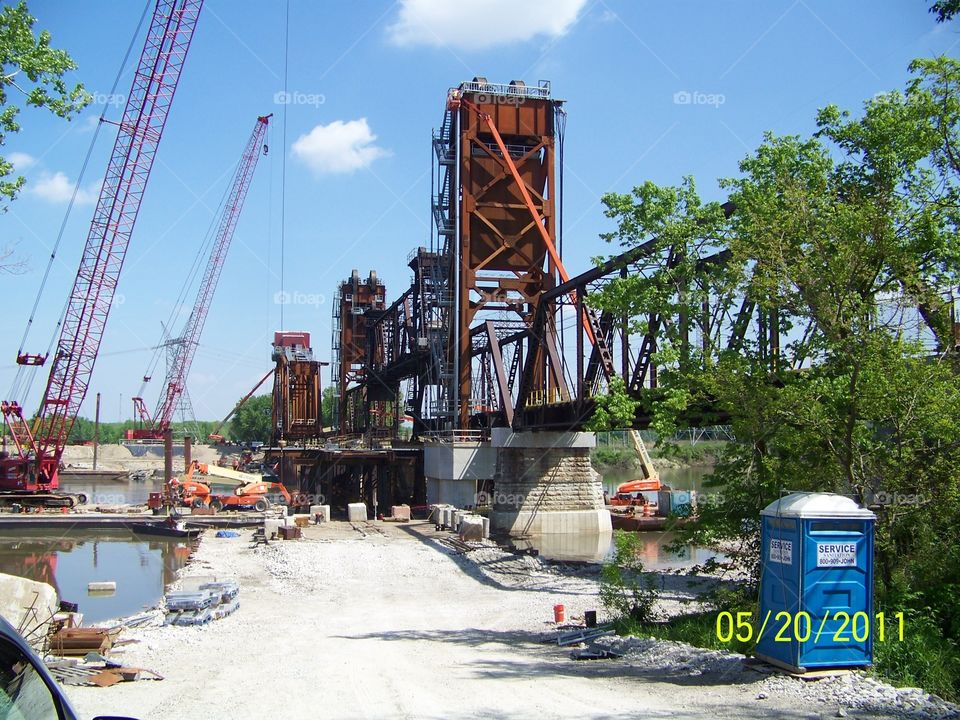 Railroad bridge construction over the river.