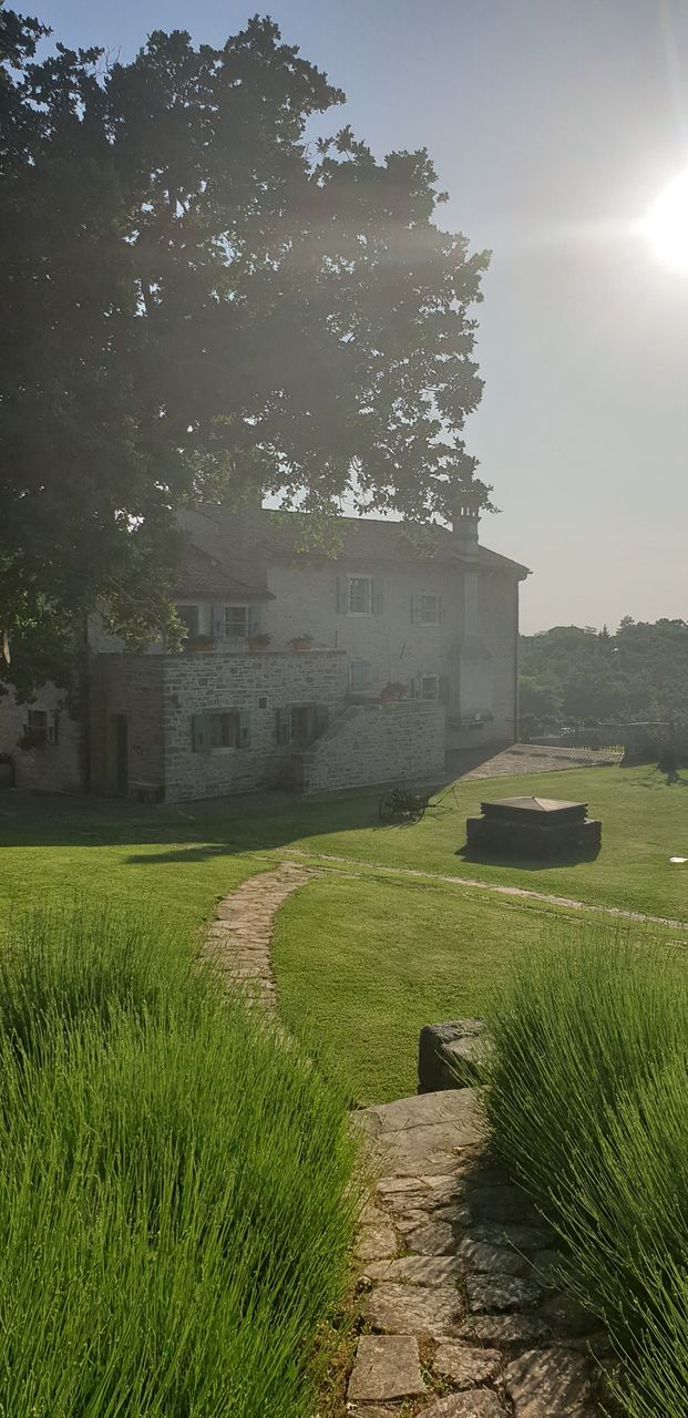 beautiful garden and stone house
