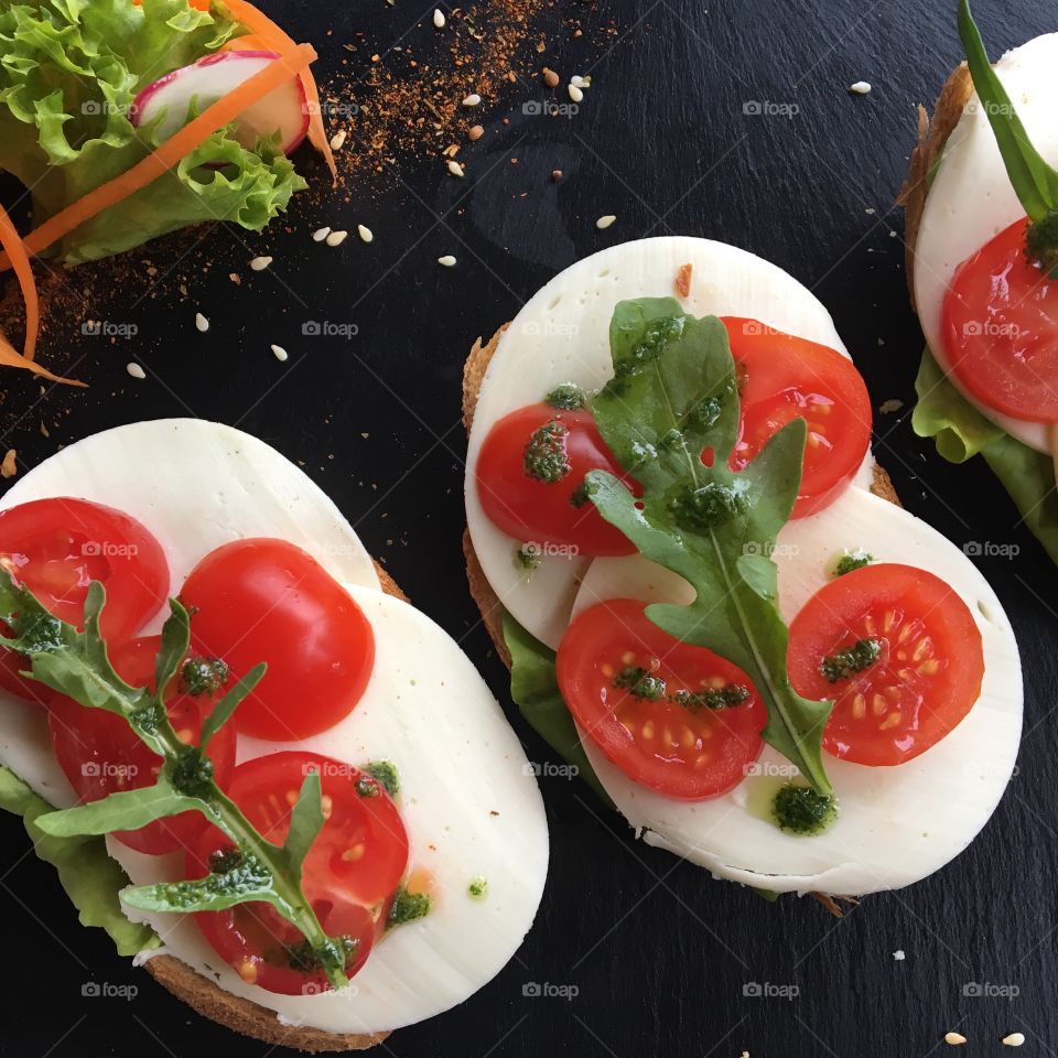 Tasty bread with mozzarella and tomato 