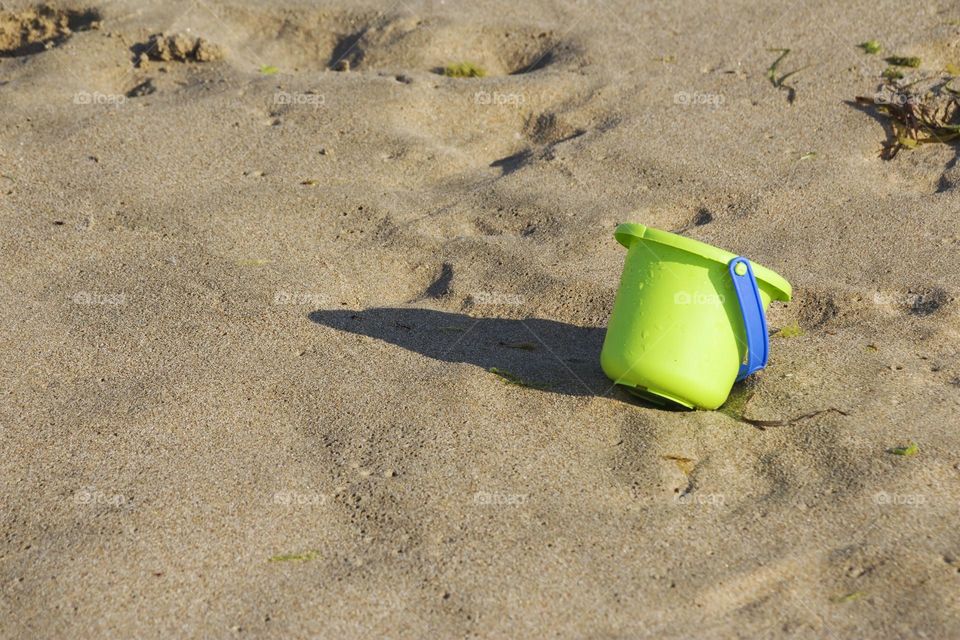 Toy on the sand of the beach