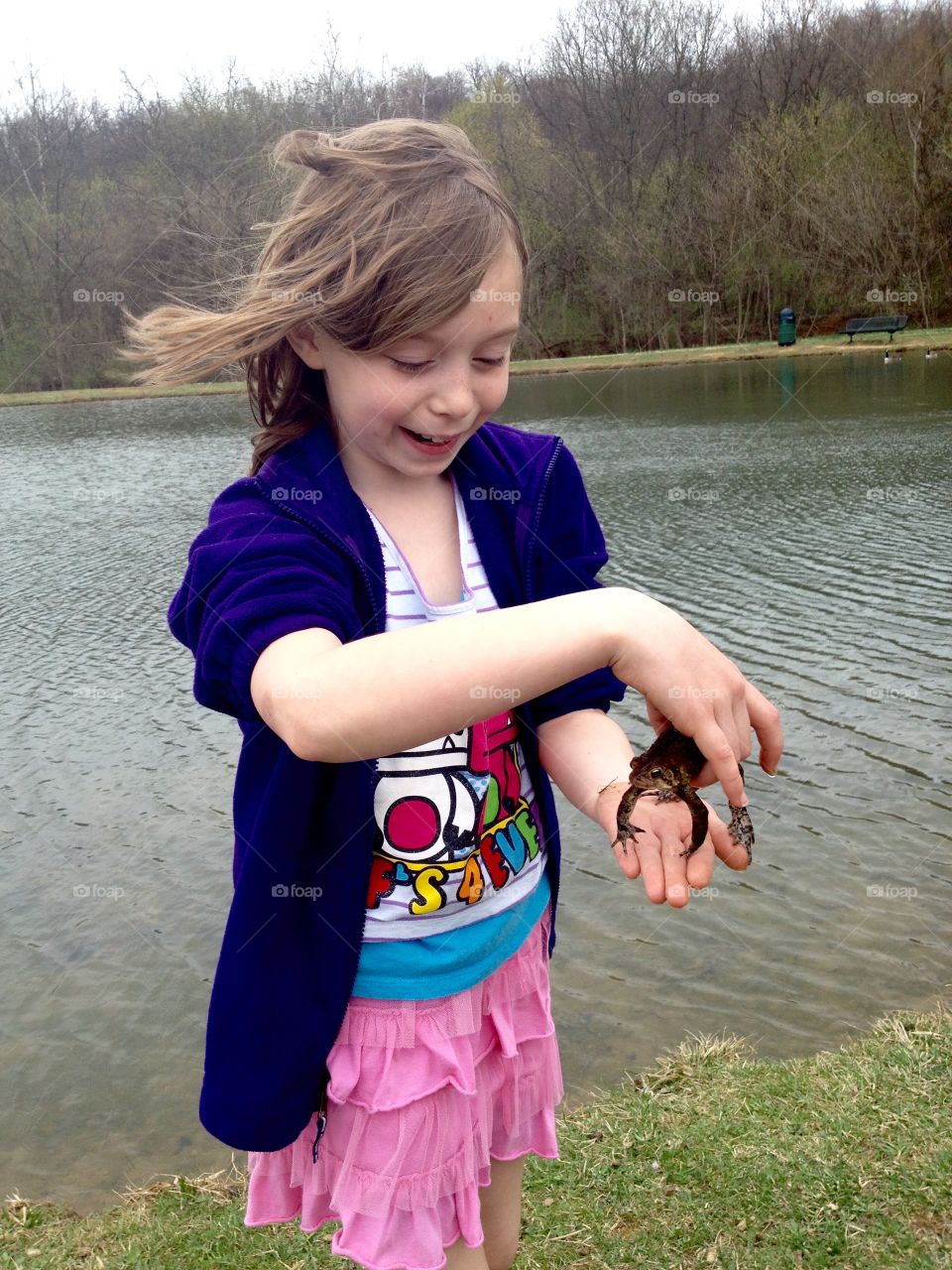 Catching Toads. She was so delighted at the first toad she caught. 
