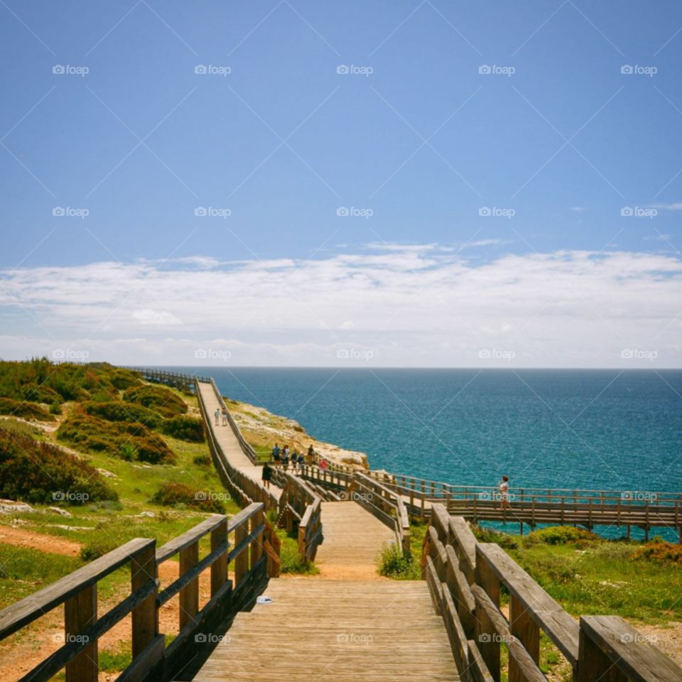 Wood walkway on the ocean cliffs in Portugal 