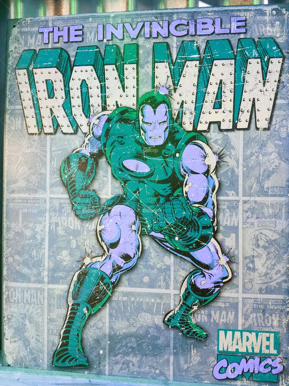 The Invincible Iron Man - Marvel Comics.  Blue and Lavender Colors.