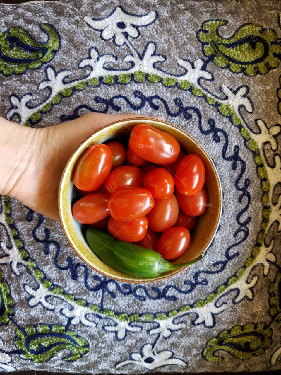 Holding grape tomatoes