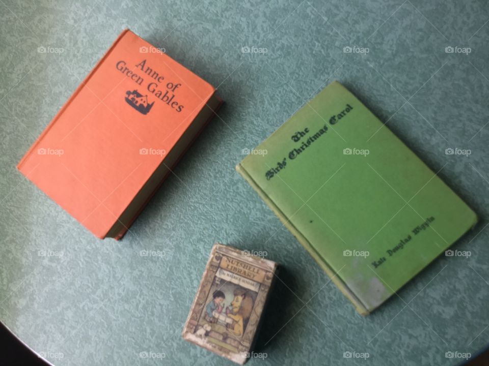 Flat lay of three antique books 
