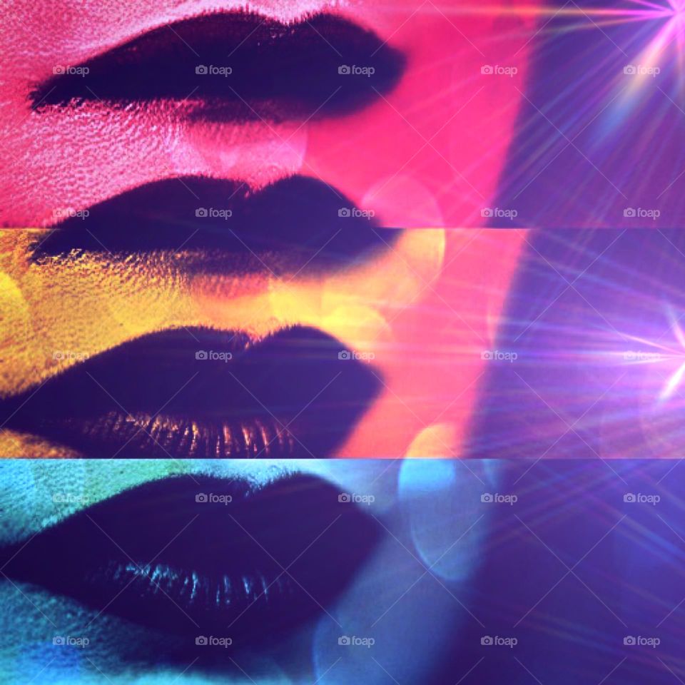 Rainbow colors on a women’s lip.