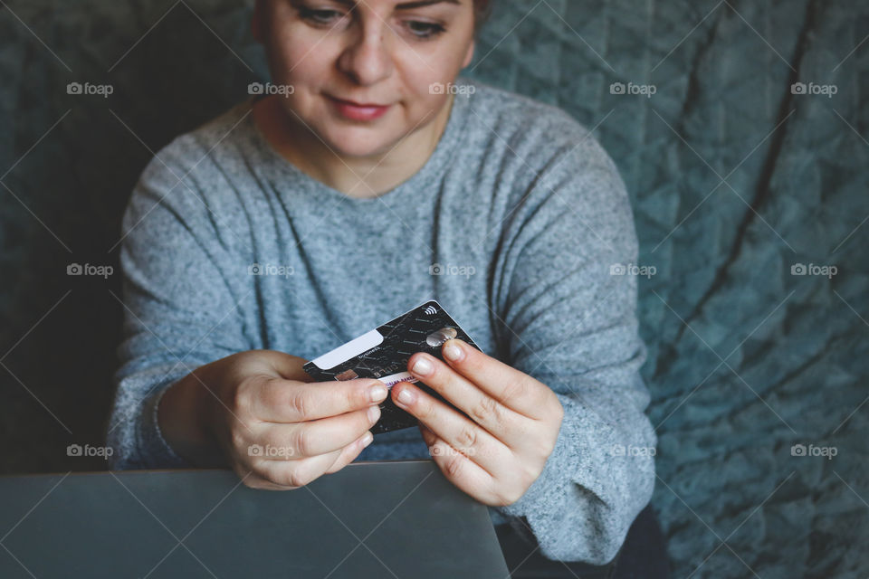 Woman holding credit cards