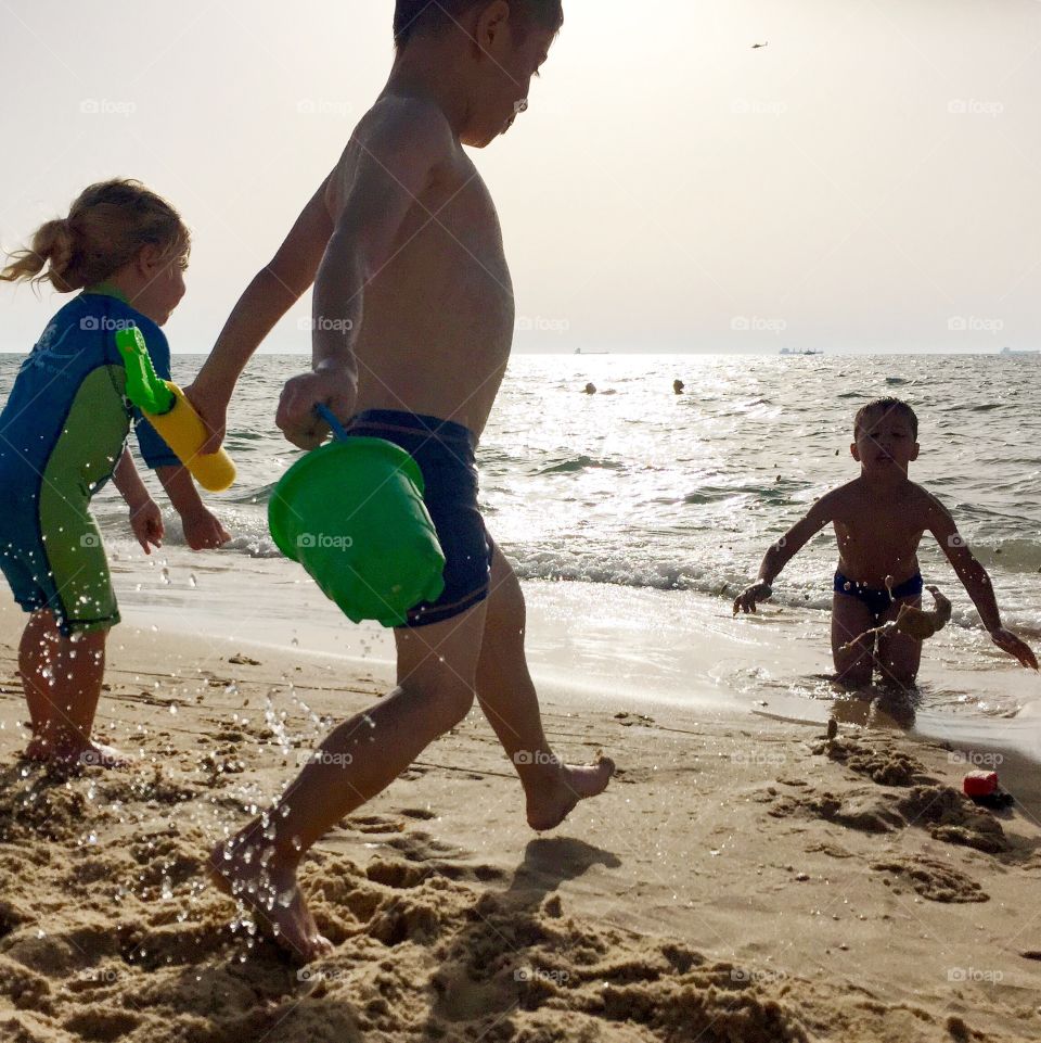 Children enjoying at beach