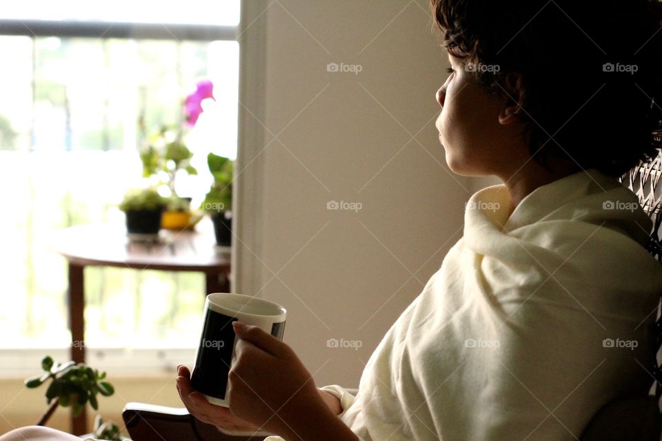 girl holding a mug of tea