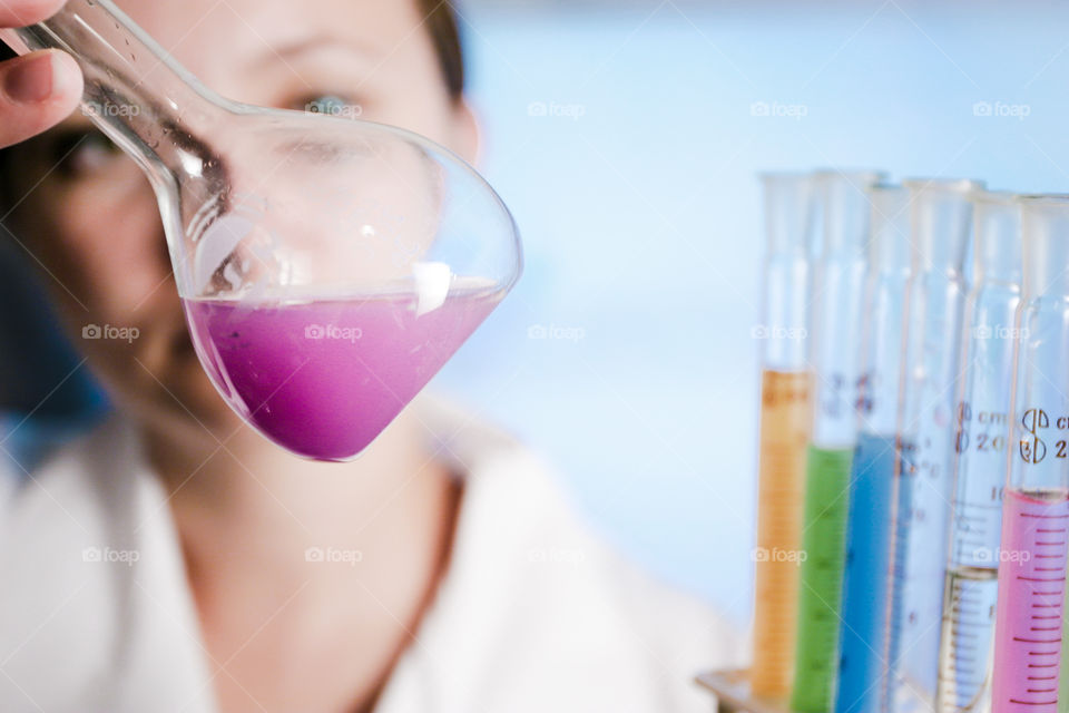 Man holding flask in the laboratory