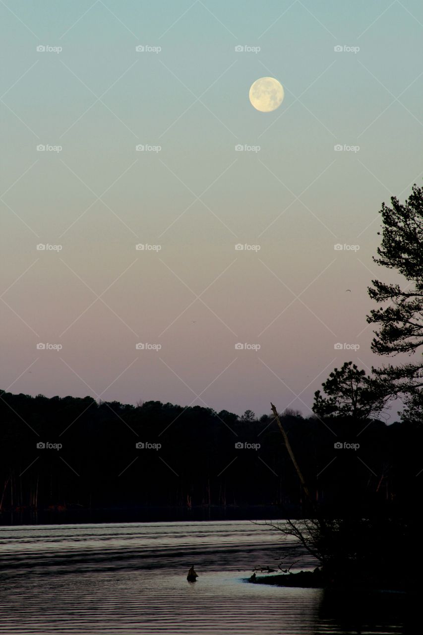 full moon over lake a