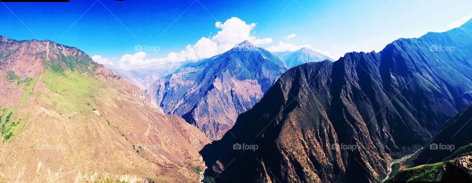 Three mountains divided by river