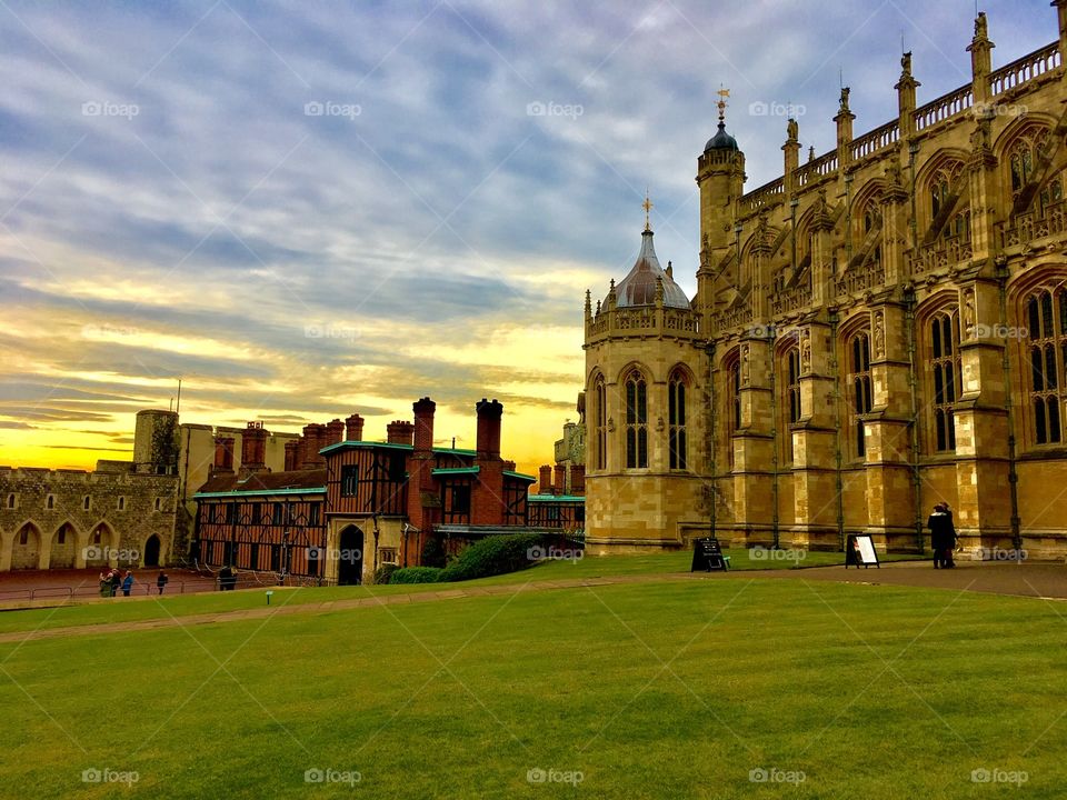 An inner lawn at Windsor Castle shows various buildings on the property, including the historic and Gothic St. George’s Chapel
